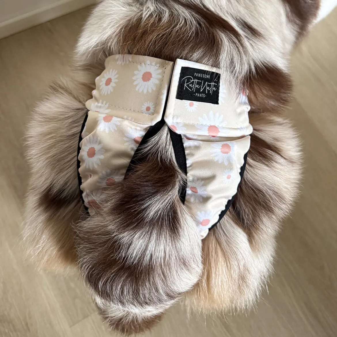 RuttuNuttu Tikskydd Blommig Beige